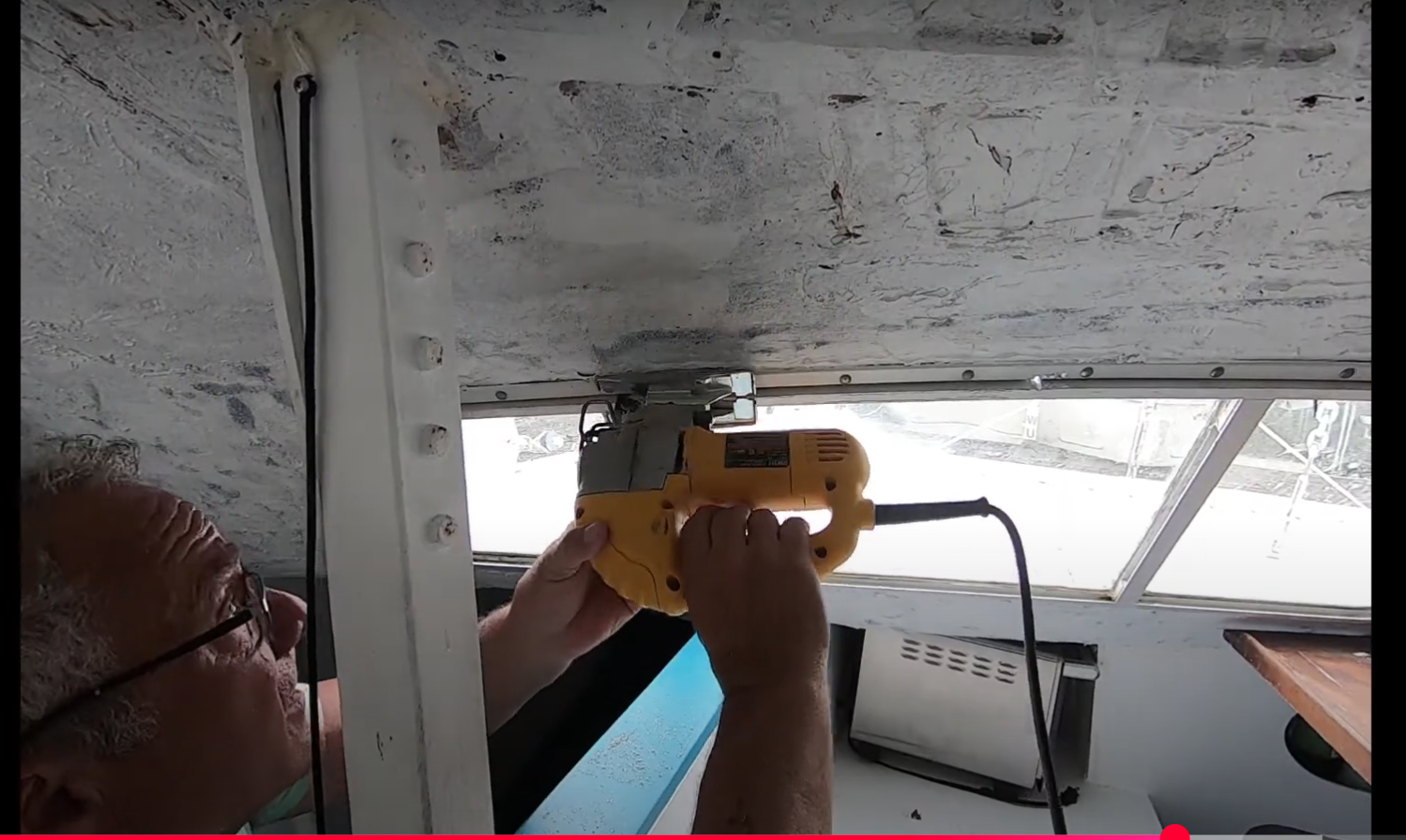 Iroquois catamaran sailboat front windows installation